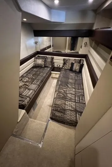  Yacht Photos Pics Interior cabin of 1994 Sunseeker Camargue 55 yacht with twin beds and modern decor.