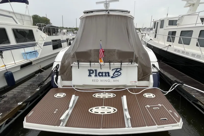 Plan B Yacht Photos Pics 2012 Cruisers Yachts 48 Cantius docked, rear view with "Plan B" name, Red Wing, MN.