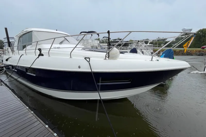 Plan B Yacht Photos Pics 2012 Cruisers Yachts 48 Cantius docked, showcasing sleek design and modern features.