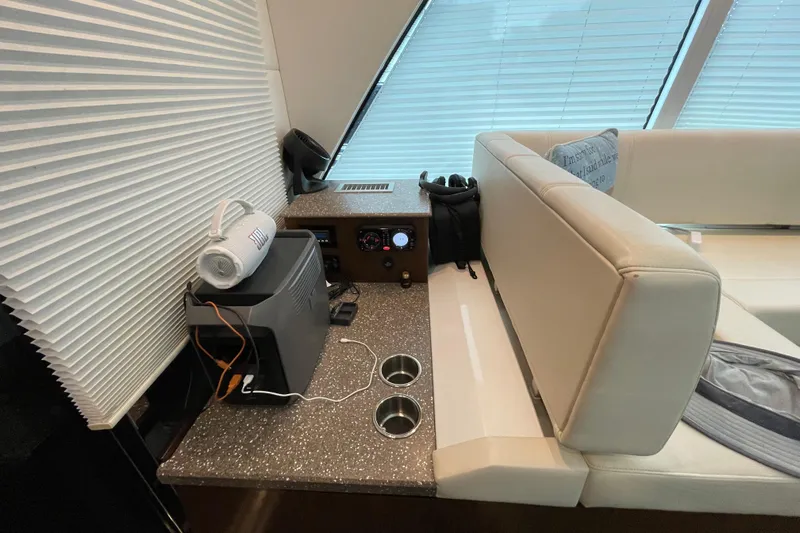 Plan B Yacht Photos Pics Interior of 2012 Cruisers Yachts 48 Cantius with seating and countertop accessories.