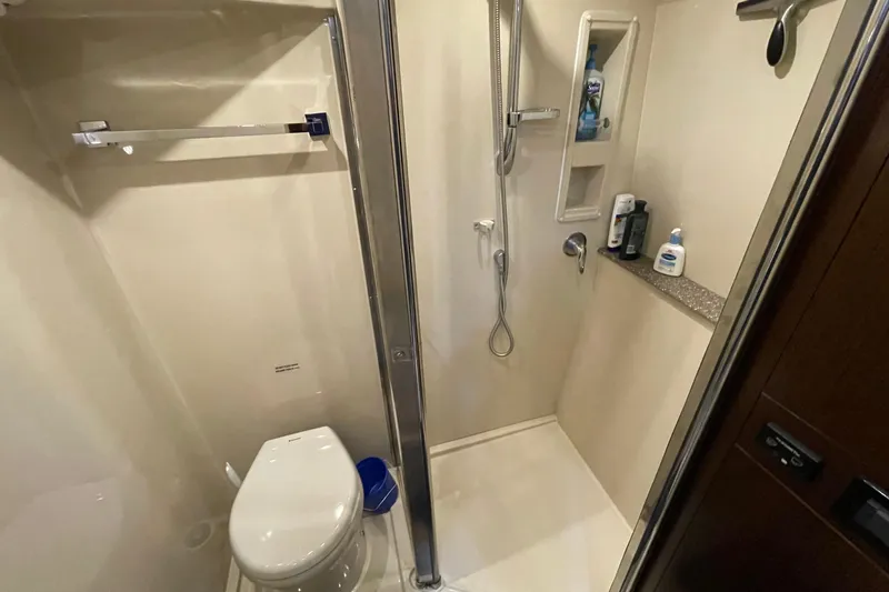 Plan B Yacht Photos Pics Bathroom interior of 2012 Cruisers Yachts 48 Cantius with shower and toilet.