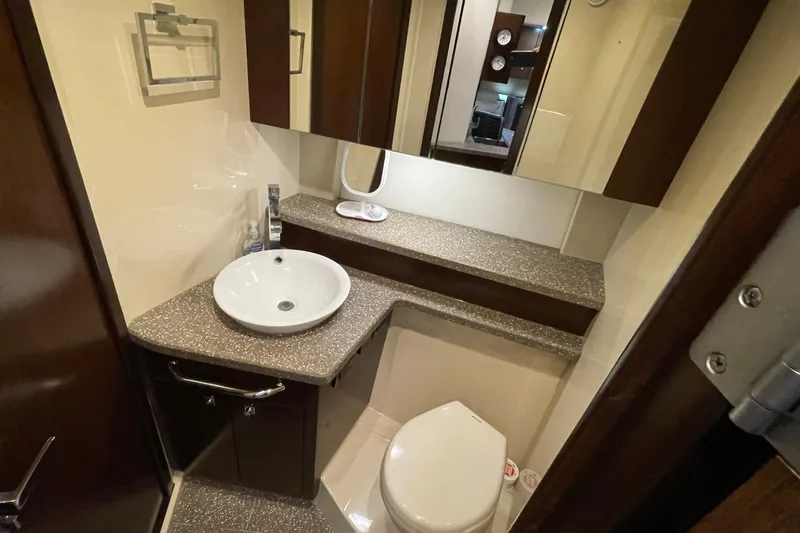 Plan B Yacht Photos Pics Luxurious bathroom in 2012 Cruisers Yachts 48 Cantius with modern fixtures and elegant design.