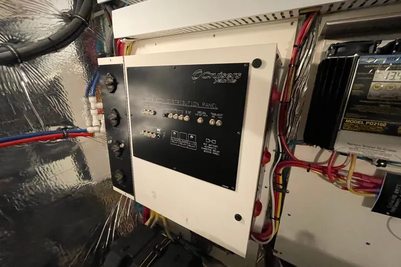 Plan B Yacht Photos Pics Electrical distribution panel in a 2012 Cruisers Yachts 48 Cantius engine room.