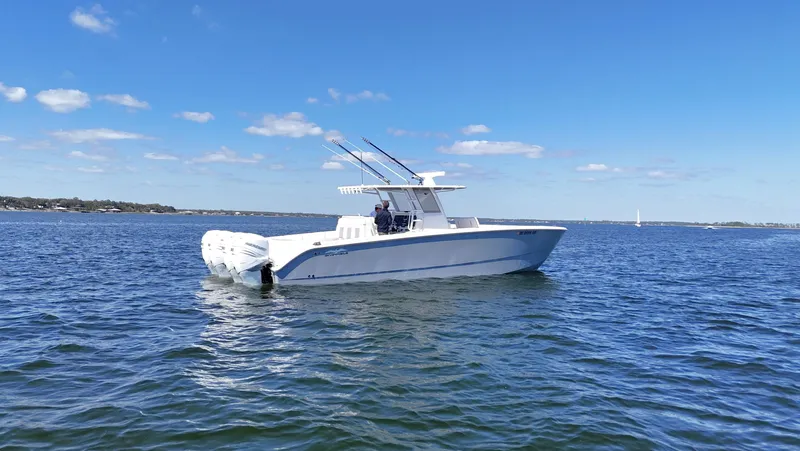 Engine Warranty Yacht Photos Pics 2020 Invincible 37 Catamaran on open water under clear blue sky.