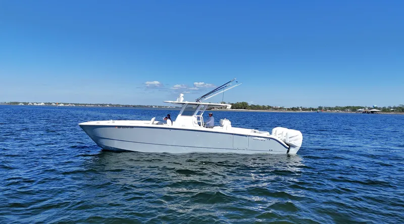 Engine Warranty Yacht Photos Pics 2020 Invincible 37 Catamaran on open water under clear blue sky.