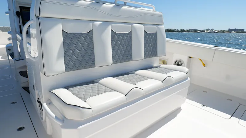 Engine Warranty Yacht Photos Pics Luxury seating on 2020 Invincible 37 Catamaran, featuring diamond-patterned upholstery.