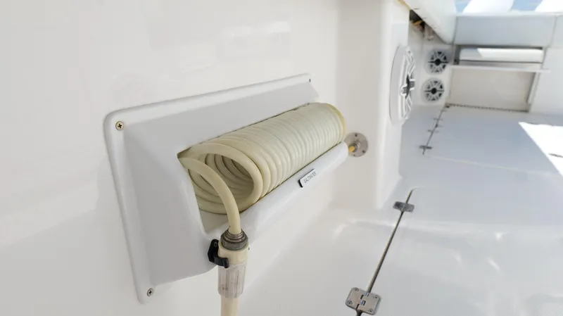 Engine Warranty Yacht Photos Pics Invincible 37 Catamaran 2020 deck with coiled hose and speaker system.