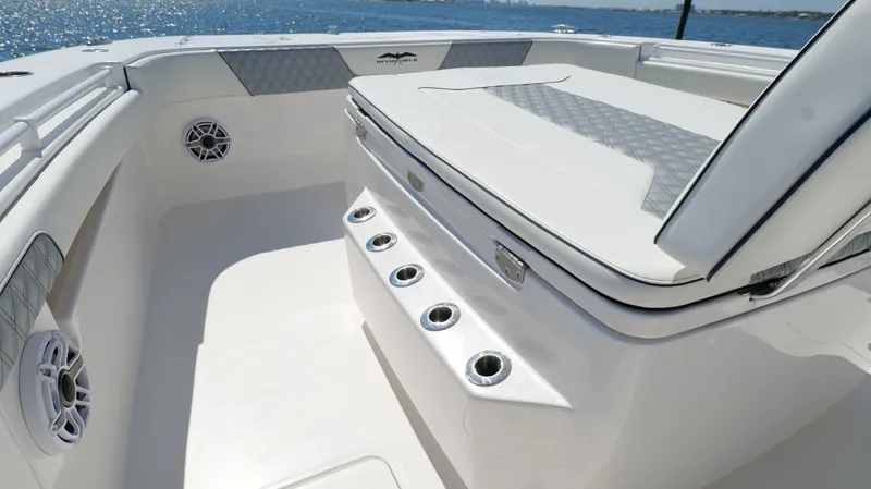 Engine Warranty Yacht Photos Pics 2020 Invincible 37 Catamaran interior with seating and rod holders, ocean view.