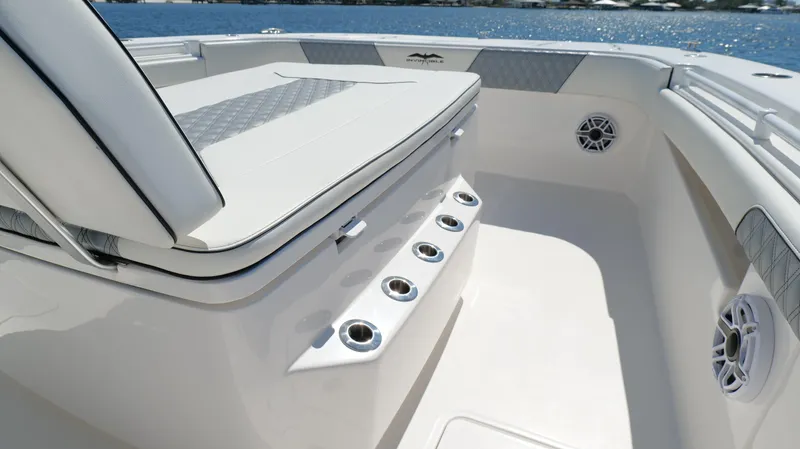 Engine Warranty Yacht Photos Pics Invincible 37 Catamaran 2020 interior with seating and cup holders, ocean view.