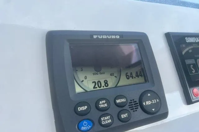 Miss Jennie Yacht Photos Pics Furuno marine display on 2008 H&H Marine 38 boat dashboard.