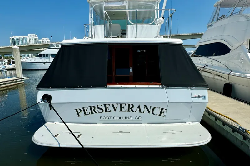 Perseverance Yacht Photos Pics 1989 Bayliner 4588 Motoryacht "Perseverance" docked at marina, rear view.