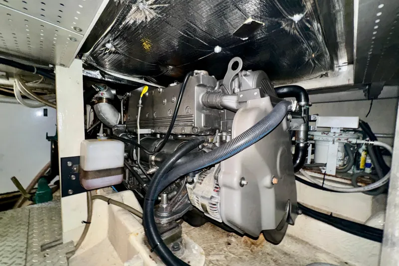 Perseverance Yacht Photos Pics Engine room of 1989 Bayliner 4588 Motoryacht, showcasing mechanical components and wiring.