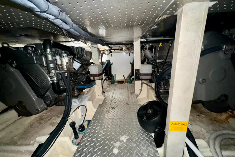 Perseverance Yacht Photos Pics Engine room of 1989 Bayliner 4588 Motoryacht with visible machinery and equipment.
