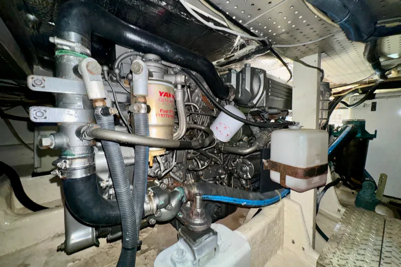 Perseverance Yacht Photos Pics Engine room of 1989 Bayliner 4588 Motoryacht showcasing mechanical components and wiring.