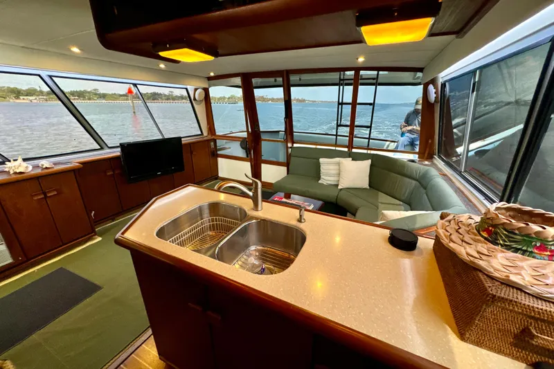 Perseverance Yacht Photos Pics Luxurious interior of 1989 Bayliner 4588 Motoryacht with spacious seating and modern amenities.