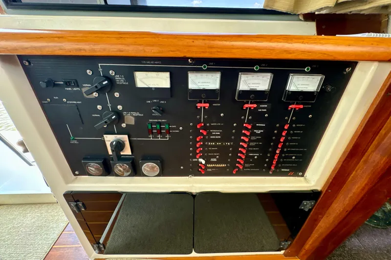 Perseverance Yacht Photos Pics Control panel of a 1989 Bayliner 4588 Motoryacht with gauges and switches.