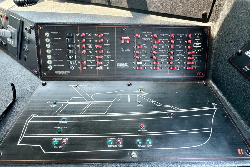 Perseverance Yacht Photos Pics Control panel of a 1989 Bayliner 4588 Motoryacht with labeled switches and diagram.