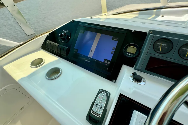 Perseverance Yacht Photos Pics Control panel of 1989 Bayliner 4588 Motoryacht with navigation display and gauges.