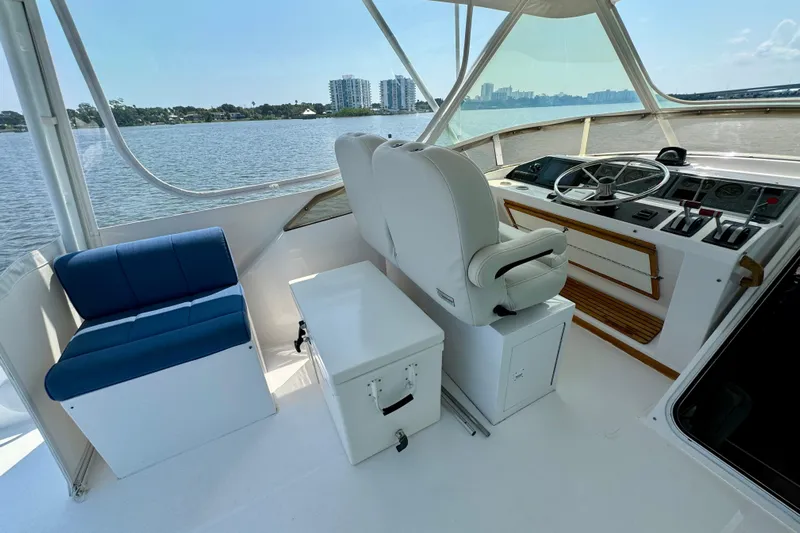 Perseverance Yacht Photos Pics Interior view of 1989 Bayliner 4588 Motoryacht helm with seating and controls.