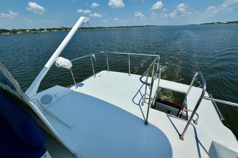 Perseverance Yacht Photos Pics 1989 Bayliner 4588 Motoryacht deck view on open water under blue sky.