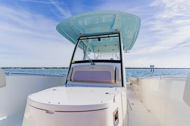  Yacht Photos Pics 2017 Cobia 344 Center Console boat on open water under clear sky.