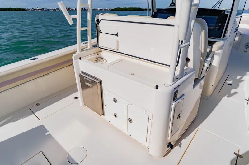  Yacht Photos Pics 2017 Cobia 344 Center Console boat interior with storage and seating.