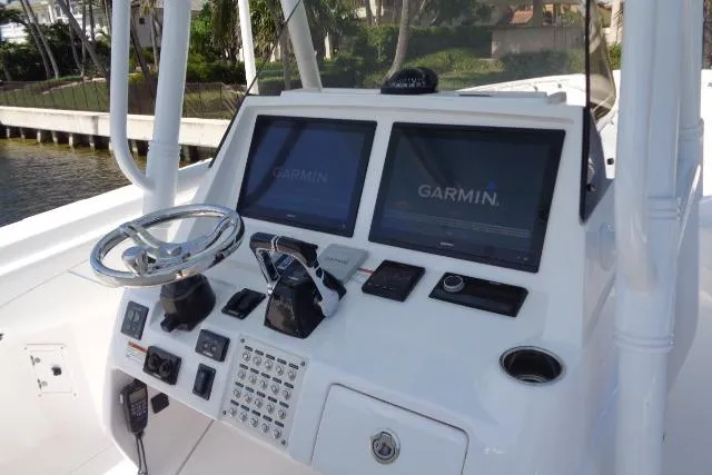  Yacht Photos Pics 2020 Intrepid 345 Nomad FE boat dashboard with Garmin navigation displays.