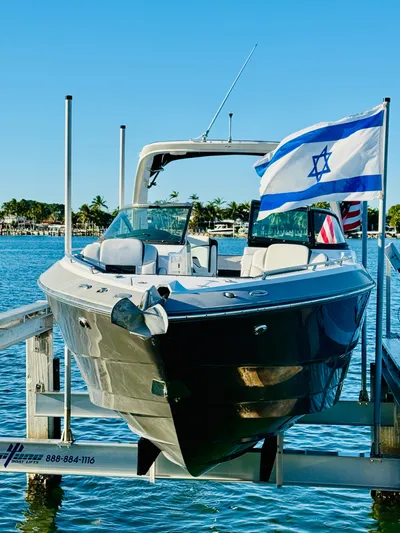 Yacht Photos Pics 2020 Monterey 328 SS boat docked with Israeli flag, sunny day.