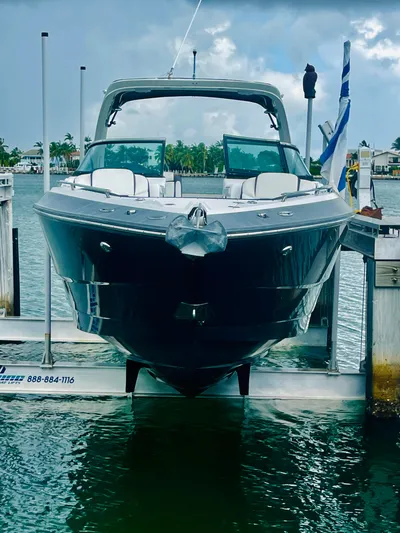  Yacht Photos Pics 2020 Monterey 328 SS boat docked at marina, cloudy sky background.