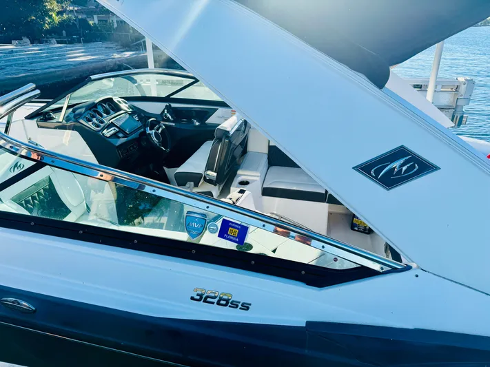  Yacht Photos Pics 2020 Monterey 328 SS boat interior with sleek design and modern dashboard.