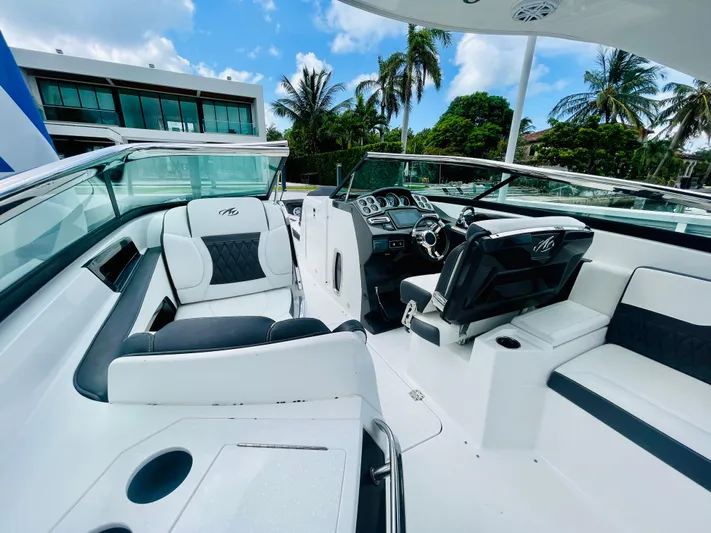  Yacht Photos Pics 2020 Monterey 328 SS boat interior with luxurious seating and modern dashboard.