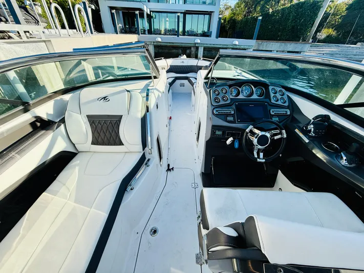  Yacht Photos Pics 2020 Monterey 328 SS boat interior with luxurious seating and modern dashboard.