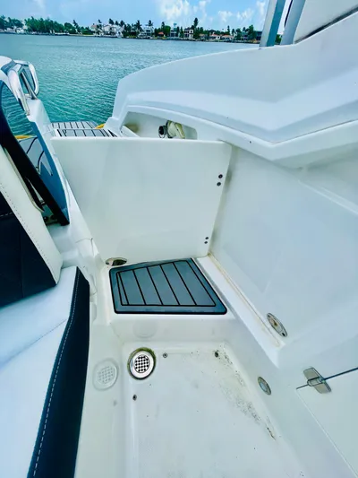  Yacht Photos Pics 2020 Monterey 328SS Super Sport boat interior with sleek white design and water view.