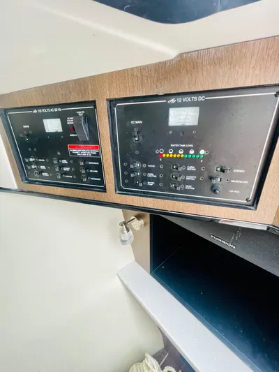  Yacht Photos Pics Control panel of 2020 Monterey 328SS Super Sport boat, featuring various switches and indicators.