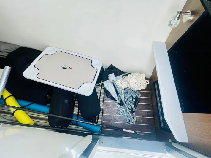  Yacht Photos Pics Storage compartment in a 2020 Monterey 328SS Super Sport boat with ropes and accessories.