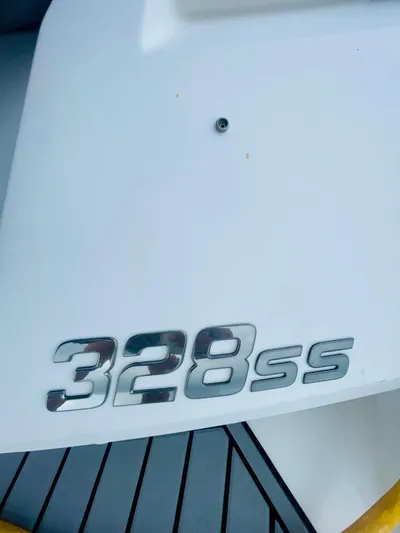  Yacht Photos Pics 2020 Monterey 328SS Super Sport boat emblem on white surface.