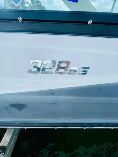 Yacht Photos Pics 2020 Monterey 328SS Super Sport boat emblem on hull.