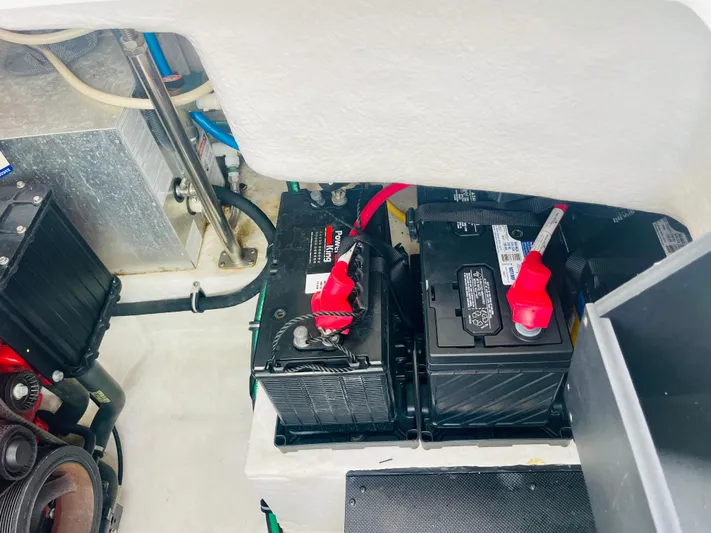  Yacht Photos Pics Battery compartment of a 2020 Monterey 328SS Super Sport boat, featuring dual batteries.