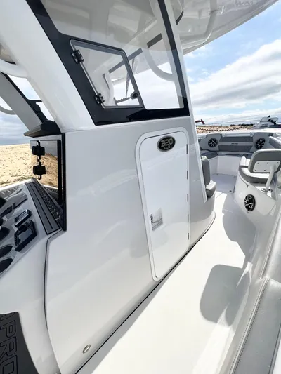  Yacht Photos Pics 2022 Sea Pro 320 DLX Offshore boat interior with sleek design and modern features.