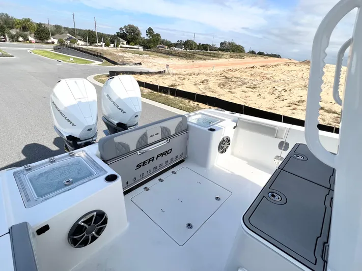  Yacht Photos Pics 2022 Sea Pro 320 DLX Offshore boat with dual Mercury engines, spacious deck, and modern features.