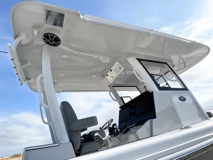  Yacht Photos Pics 2022 Sea Pro 320 DLX Offshore boat console with modern design and equipment.