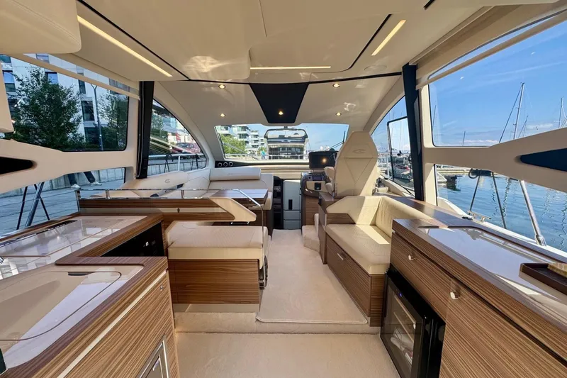 Custom Order Yours Today! Yacht Photos Pics Luxurious interior of 2026 Cobrey 45 FLY yacht with modern design and waterfront view.