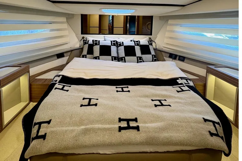 Custom Order Yours Today! Yacht Photos Pics Luxurious bedroom interior of 2026 Cobrey 45 FLY yacht with elegant bedding.