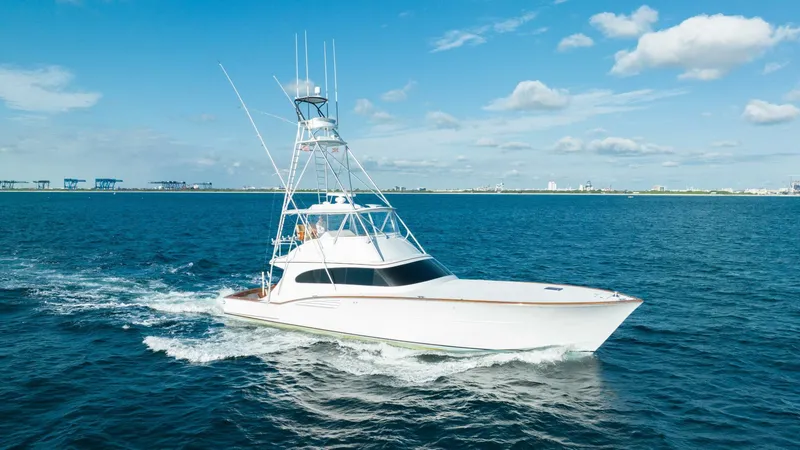 Blue Angel Yacht Photos Pics 2013 Garlington 61 Convertible yacht cruising on open water.