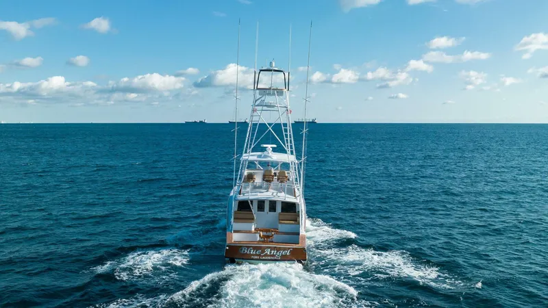 Blue Angel Yacht Photos Pics 2013 Garlington 61 Convertible yacht Blue Angel cruising on open sea.