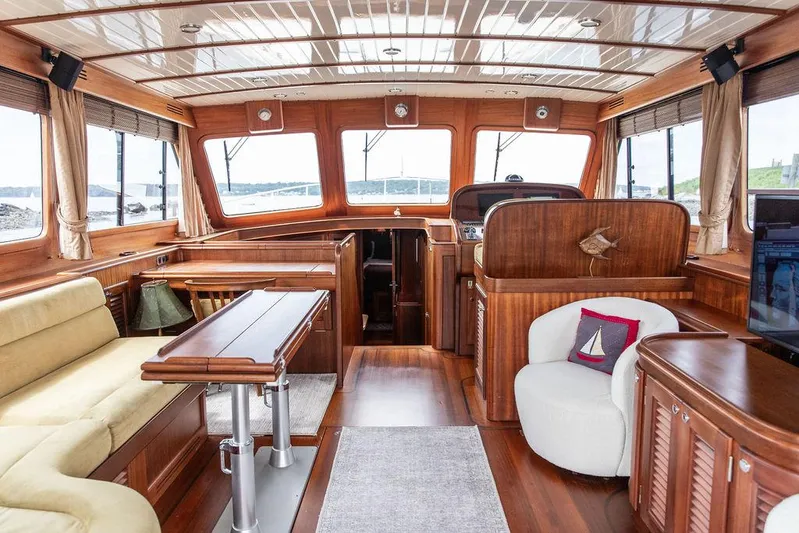 Grace Yacht Photos Pics Luxurious interior of 2007 Vicem 54 Classic Flybridge yacht with elegant wood finishes.