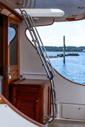 Grace Yacht Photos Pics 2007 Vicem 54 Classic Flybridge yacht with wooden interior and ocean view.