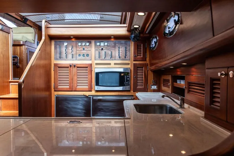 Grace Yacht Photos Pics Luxurious 2007 Vicem 54 Classic Flybridge yacht interior with modern kitchen amenities.