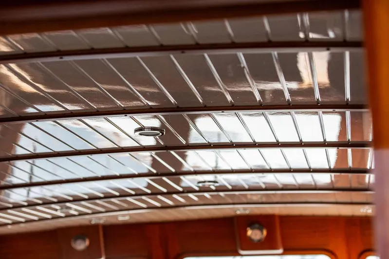Grace Yacht Photos Pics Polished wooden ceiling of 2007 Vicem 54 Classic Flybridge yacht interior.