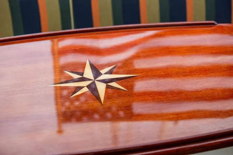 Grace Yacht Photos Pics Polished wood surface with star inlay on 2007 Vicem 54 Classic Flybridge.